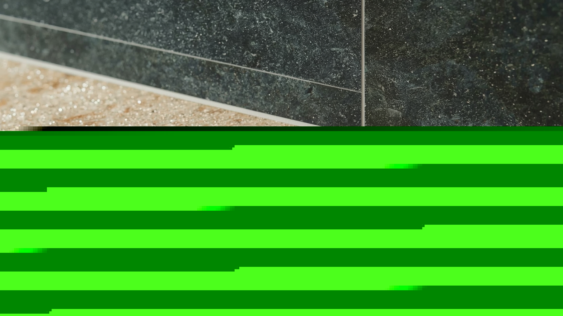 Close-up of honed travertine and slate natural stone tiles for biophilic bathroom design